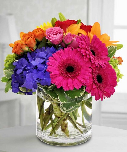 Kaleidoscope showcases a gorgeous variety of pinks, blues, oranges and green in Kensington MD, Palace Florists