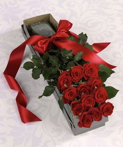 One dozen royal roses with accent flowers and foilage in a box with a bow in Washington DC and Rockville MD, Palace Florists