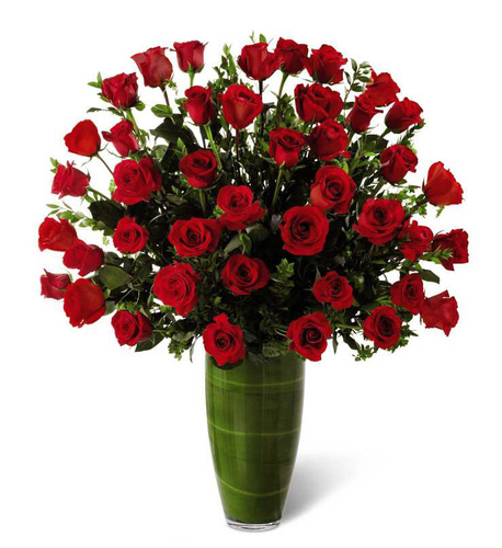 Three dozen royal roses with accent flowers and foliage in a clear vase in  Rockville MD, Palace Florists